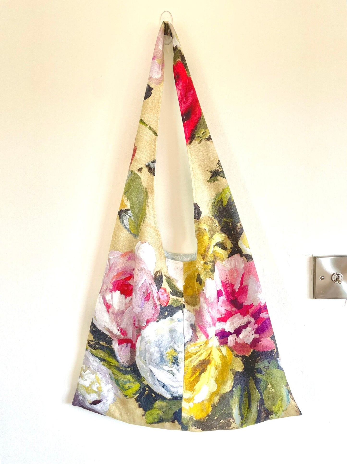 Shoulder bucket bag in floral linen and cotton patterns. Handmade in Ireland using upcycled fabrics