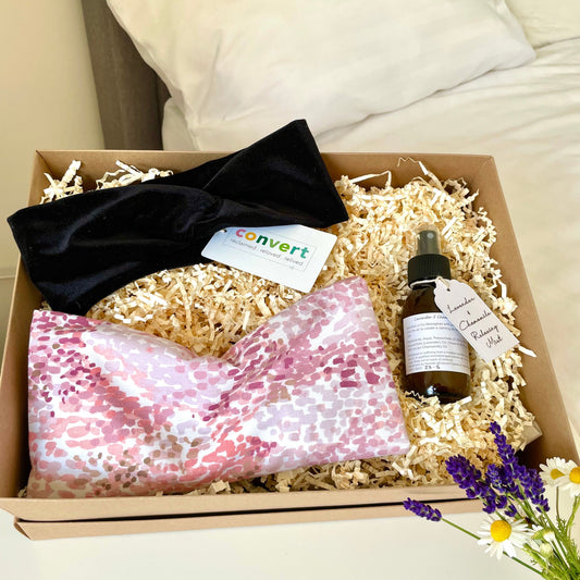 relaxation self care hamper all contents handmade in Ireland. Features an upcycled pink weighted eye pillow, black velvet stretch headband and lavender pillow spray.